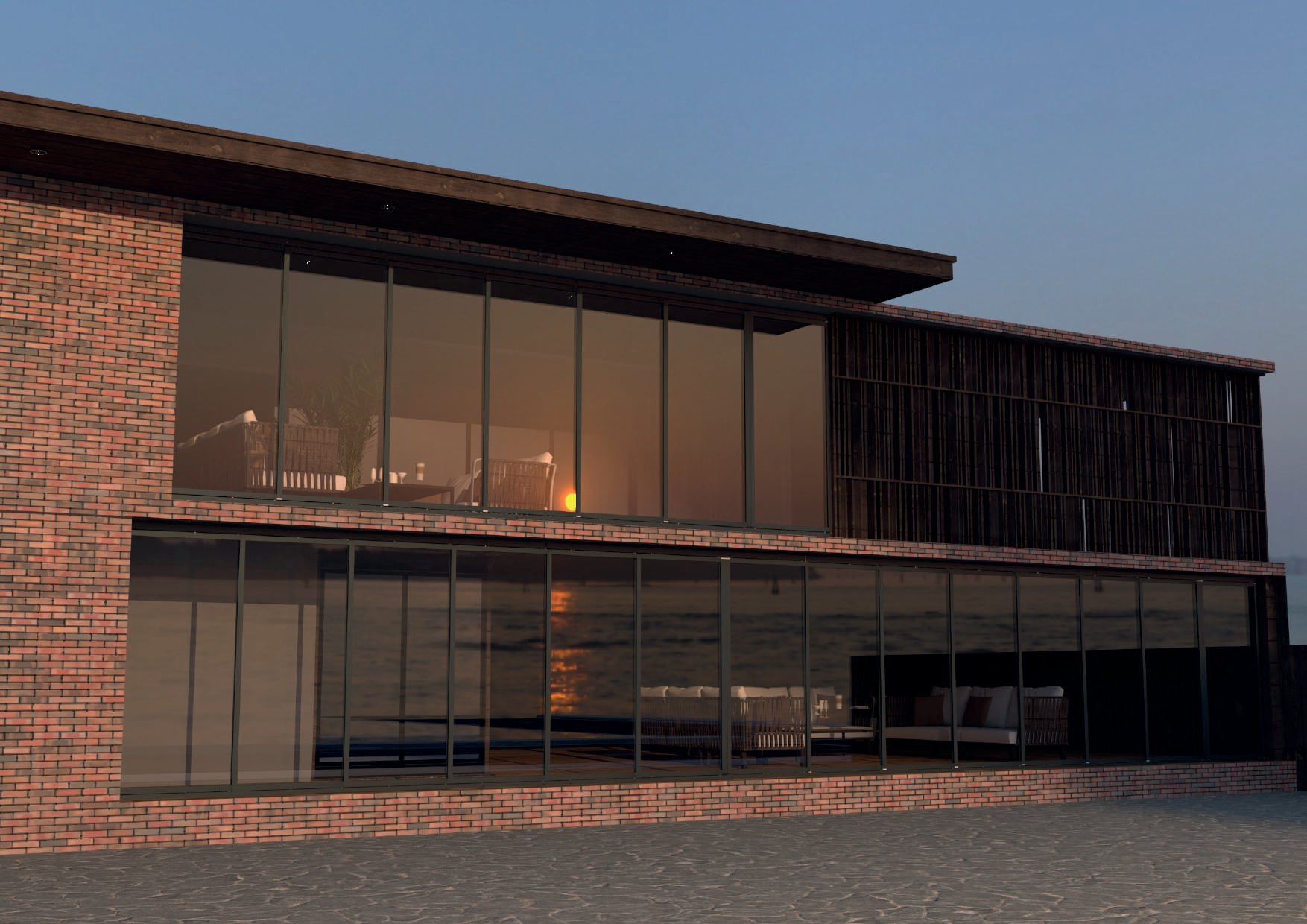 FLEXA: A dark glazed facade spanning two levels of a brick building.