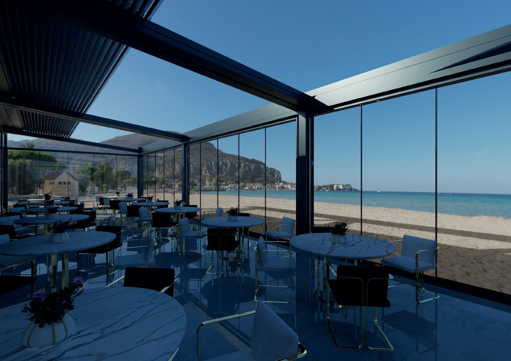 REVOLA: A glazed seaside terrace beneath partially open roof louvers.