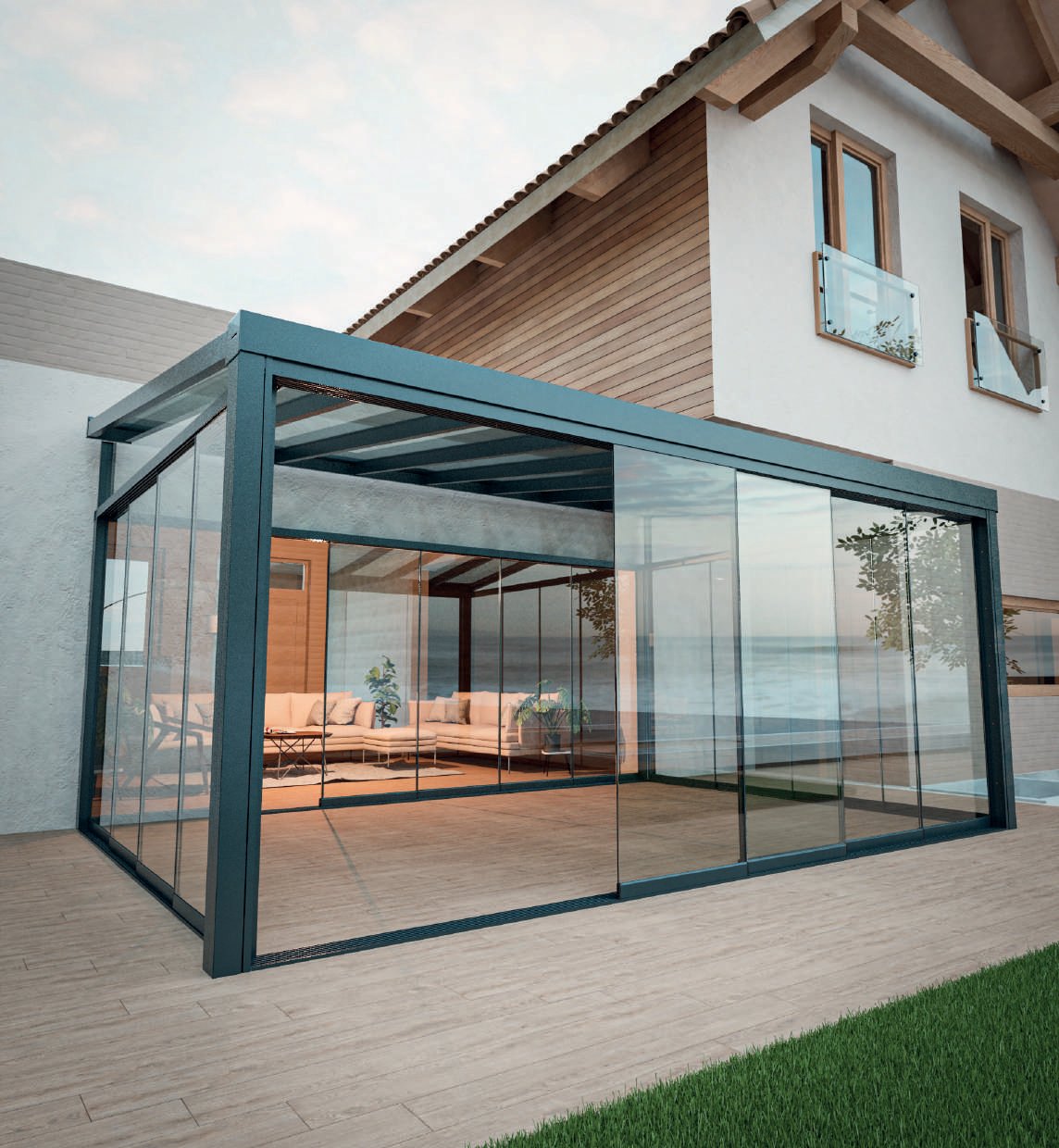 VITRANA: A freestanding glazed pavilion beside a house.