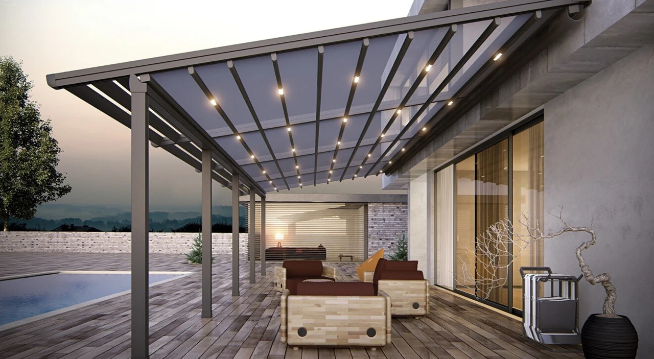 Catalog illustration of closely spaced fabric-roof support profiles above a residential dining terrace.