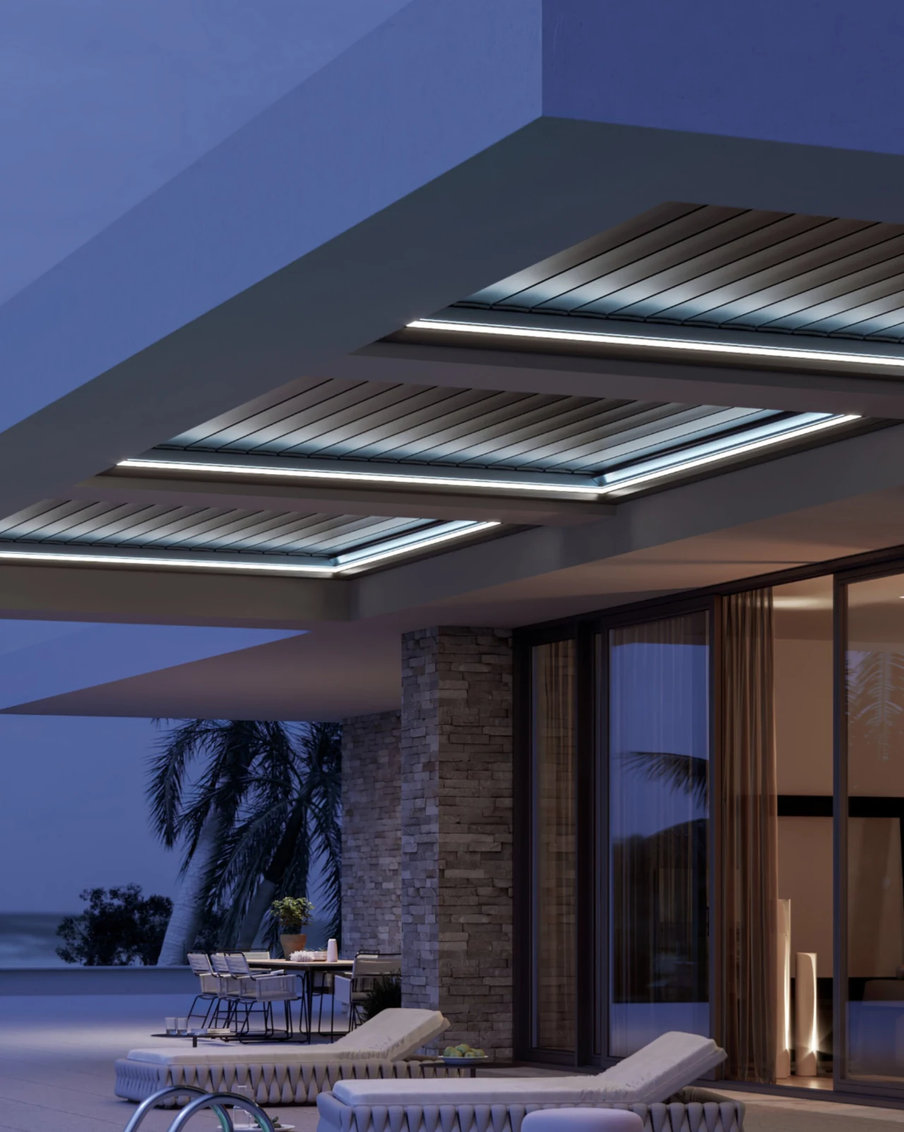 Three closed louver bays outlined with white lighting above a poolside terrace at dusk.
