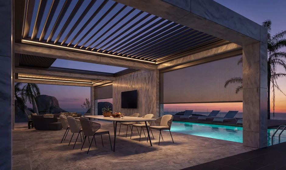 Dining terrace beneath open louvers, with a partially lowered side screen and illuminated pool at dusk.